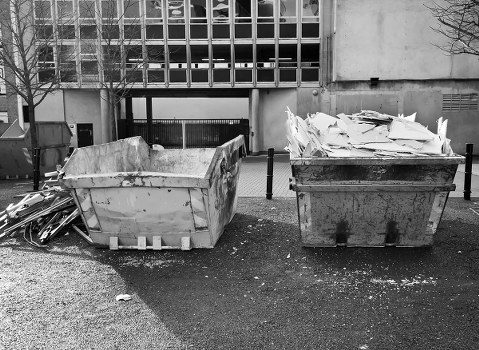 Professional team clearing a cluttered garage in Kentish Town